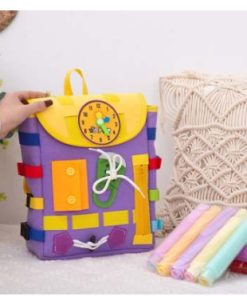 Plecak manipulacyjny z klamrami – tablica sensoryczna Montessori